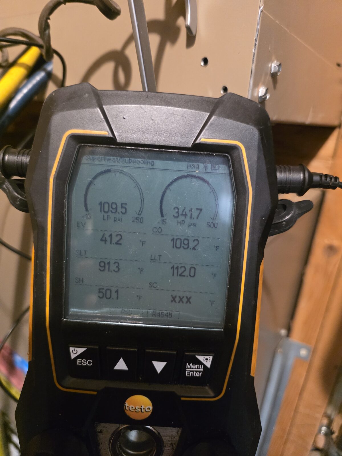 Testo digital manifold gauges connected during HVAC diagnostics